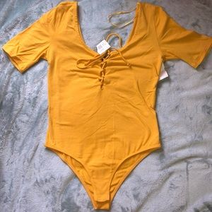 Mustard body suit